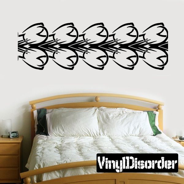 Tribal vinyl wall decal with black swirling arcs pattern, removable sticker art