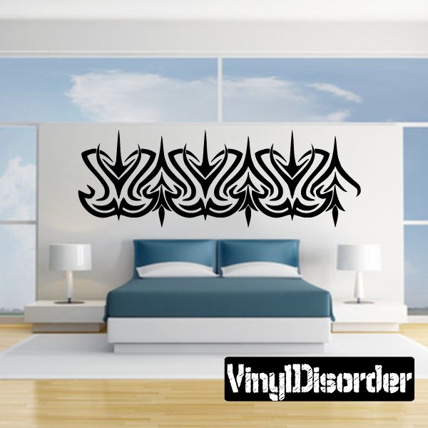 Black tribal wall decal with spiky flame-style lettering, vinyl lettering design