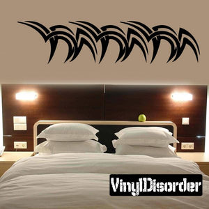 Tribal vinyl wall decal with black curved feather swirl design