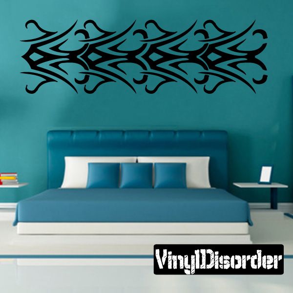 Tribal bracelet wall decal with black repeating arched swirl pattern