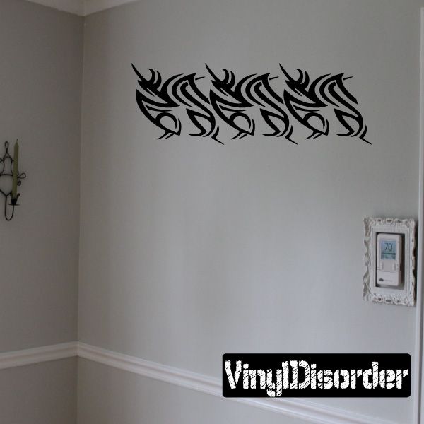 Tribal wall decal with black flame-like swirl pattern