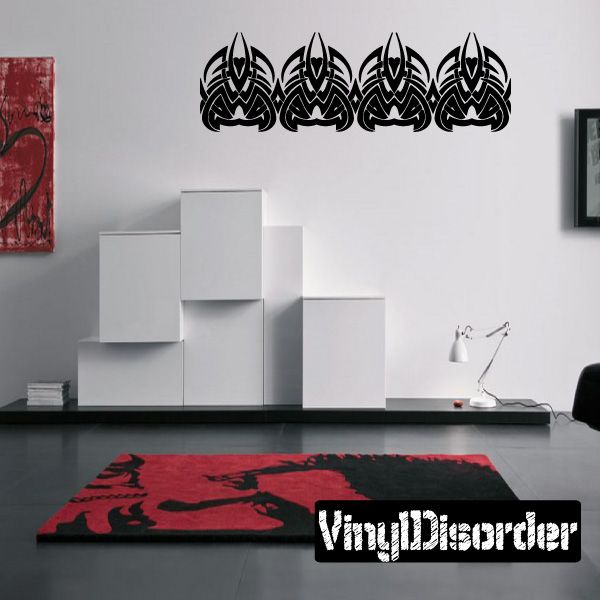 Black tribal vinyl wall decal with repeating emblem row