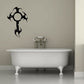 Tribal Celtic cross decal with tribal knot detailing, black design on wall.