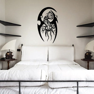 Tribal fish wall decal with black circular design and two outlined fish