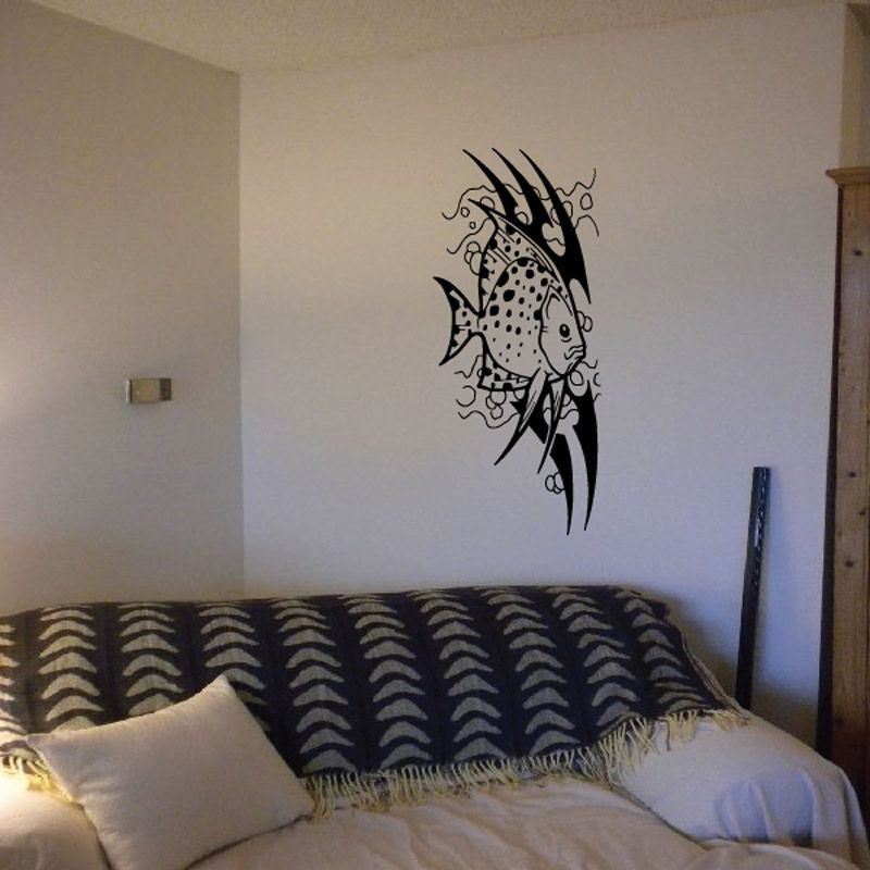 Tribal fish vinyl wall decal with black and white spatter details