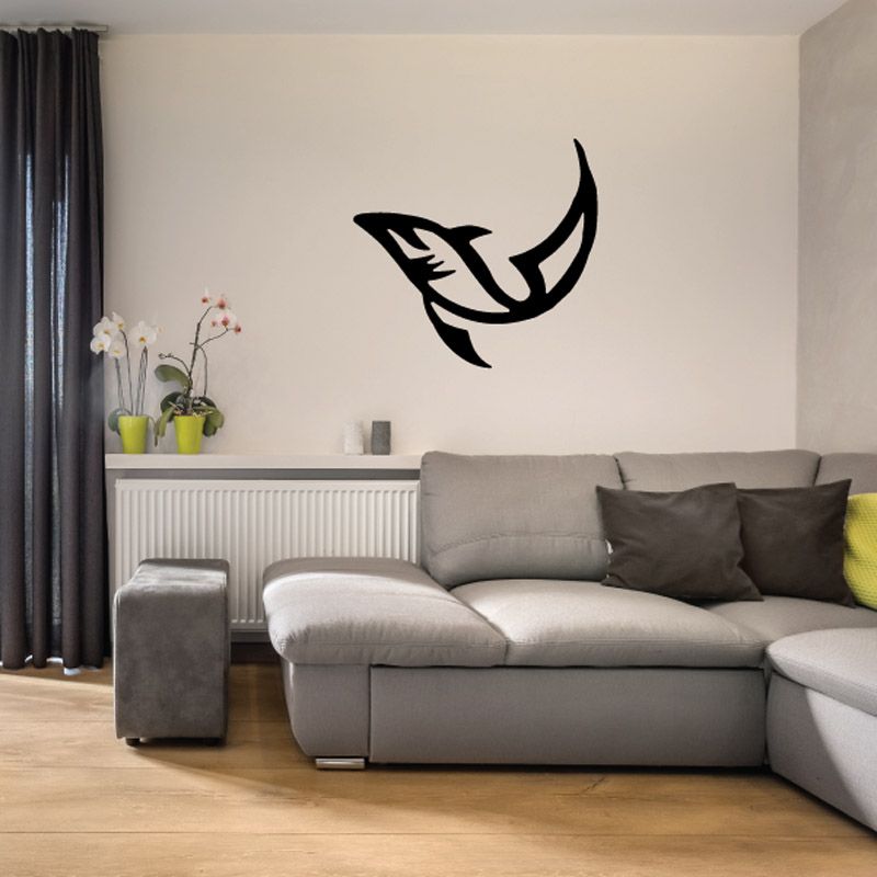 Tribal fish wall decal, black vinyl fish silhouette on light wall.