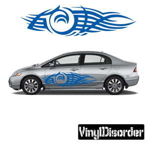 Blue tribal flame swirl vinyl decal on car door panel