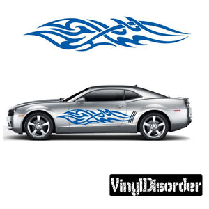 Blue tribal flame vinyl decal with sweeping wave pattern