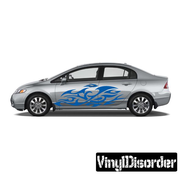 Vinyl flame car decal with blue tribal swirl flames, applied on a light gray sedan