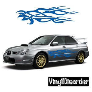 Silver car with blue tribal flame vinyl decal on the side door and lower panel