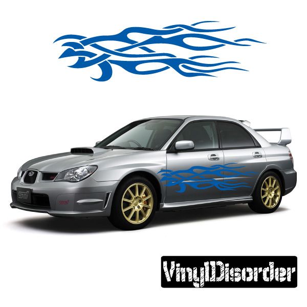 Silver car with blue tribal flame vinyl decal on the side door and lower panel