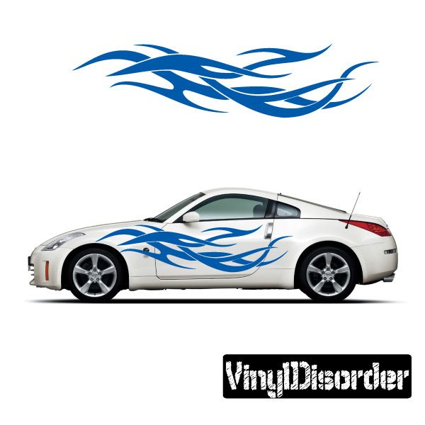 Tribal flames vinyl decal in blue on a white car door and hood.