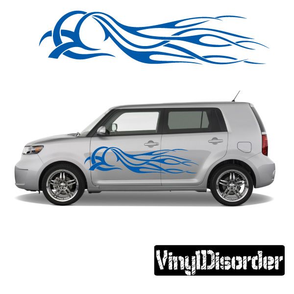 Car side vinyl decal with blue tribal flame design on silver vehicle