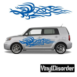 Blue tribal flame vinyl decal for car, sweeping across side door area