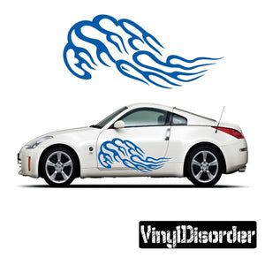 White car side vinyl decal with blue tribal flame graphic along doors