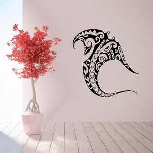 Tribal manta ray wall decal with black flowing tail and ornate swirl details