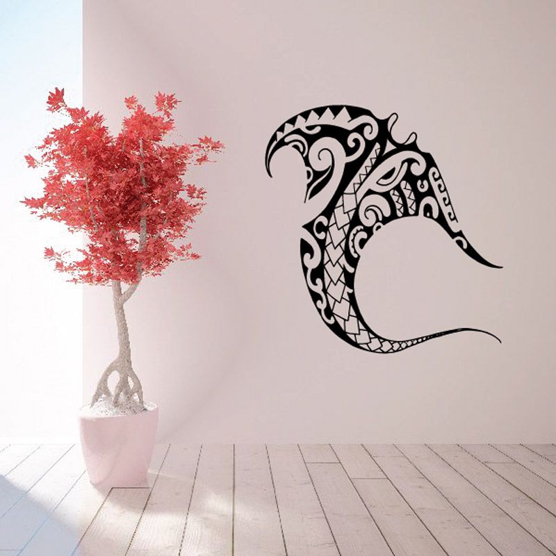 Tribal manta ray wall decal with black flowing tail and ornate swirl details