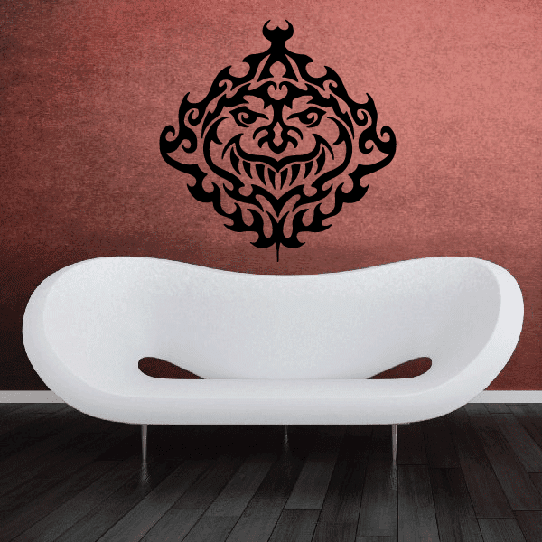 Tribal grinning mask decal with ornate black face and white grin mouth