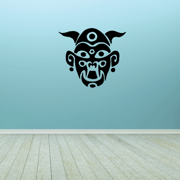 Tribal monkey mask decal with circular eyes and open mouth, black design
