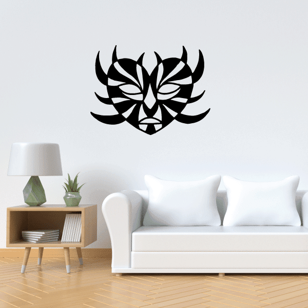 Black tribal heart mask decal with stylized face and winged flourishes.
