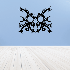 Tribal lightning sprite mask decal, black ornamental mask with two light-blue eyes
