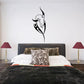 Tribal dolphin fin decal with long spiked silhouette, black wall sticker