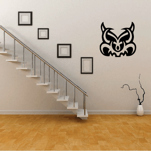 Tribal pig mask decal, black stylized boar head graphic