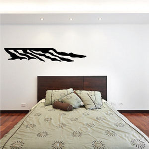 Tribal pinstripe vinyl wall decal with bold black curved flame-like stripes