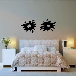 Tribal wall decal with two black starburst pinstripe shapes