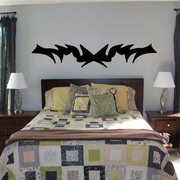 Tribal pinstripe wall decal, black vinyl sticker with a spiky bat-like shape