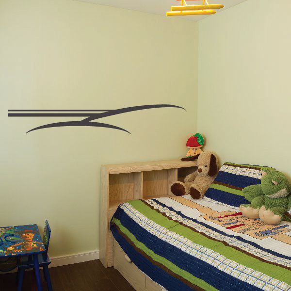 Tribal pinstripe wall decal: black curved tribal line design on a wall
