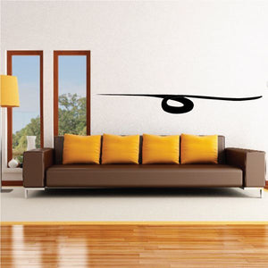 Black vinyl wall decal with curved stripe and small centered oval