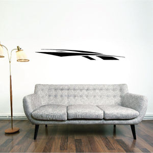 Tribal pinstripe vinyl wall decal with black streak design on a light wall