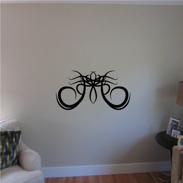 Black tribal pinstripe wall decal with looping curved lettering