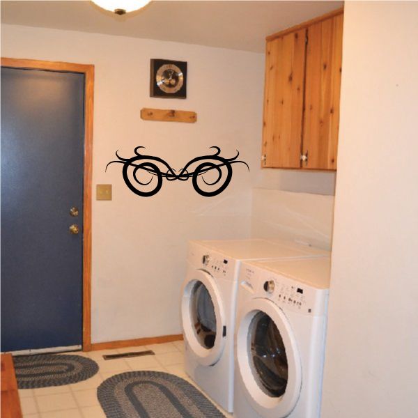 Black vinyl wall decal with tribal pinstripe scroll and eye-catching swirl shapes