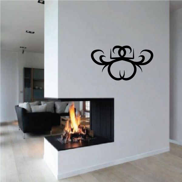 Tribal swirl wall decal, black vinyl pattern on a light wall