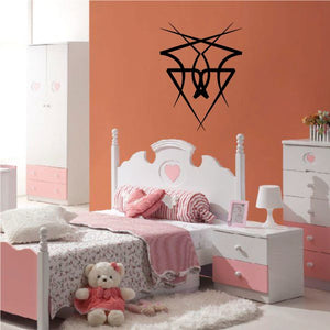 Tribal geometric wall decal with black crossed lines and heart in center