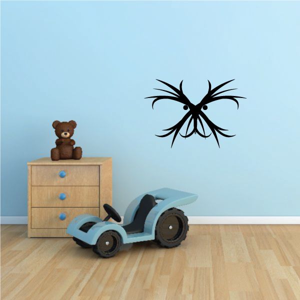 Black tribal spiky wall decal with starburst center