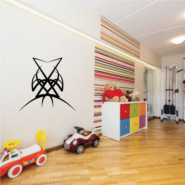 Black tribal pinstripe wall decal with abstract star-like line pattern