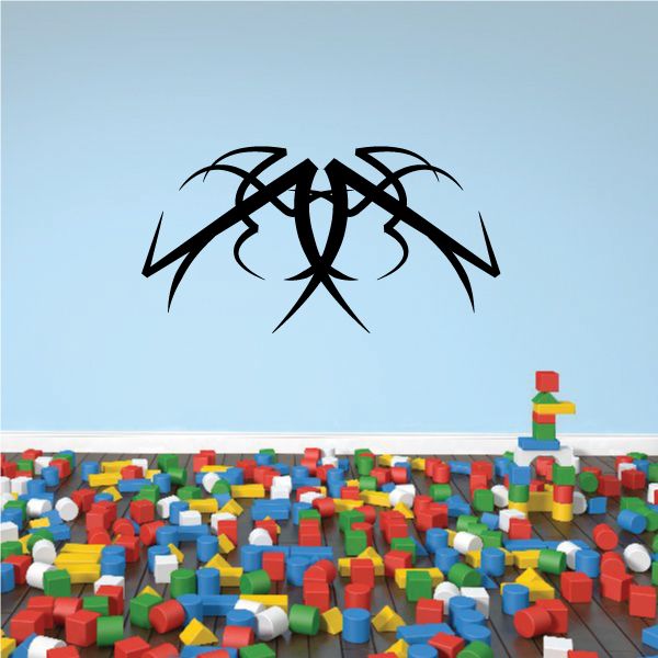 Tribal pinstripe vinyl wall decal with black tribal emblem, split-wing style