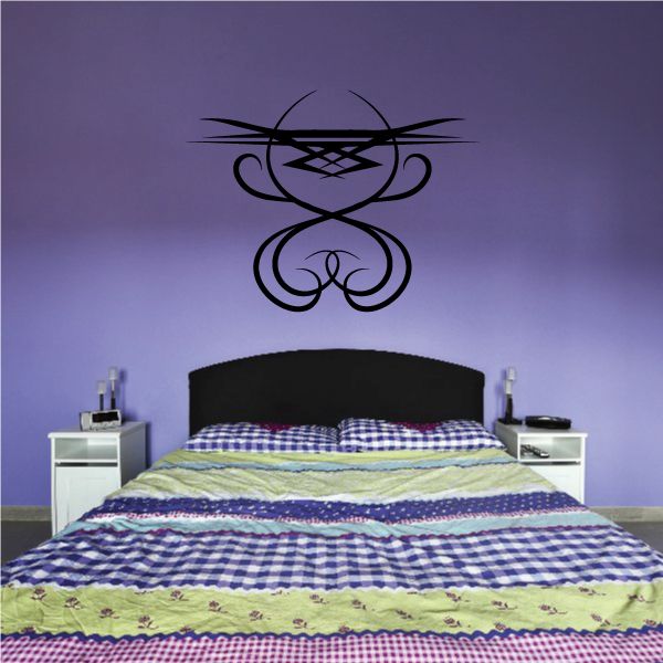 Tribal pinstripe wall decal with black symmetrical abstract emblem