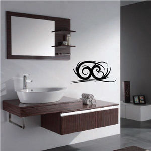 Black tribal owl wall decal with curled tail and swirling accents