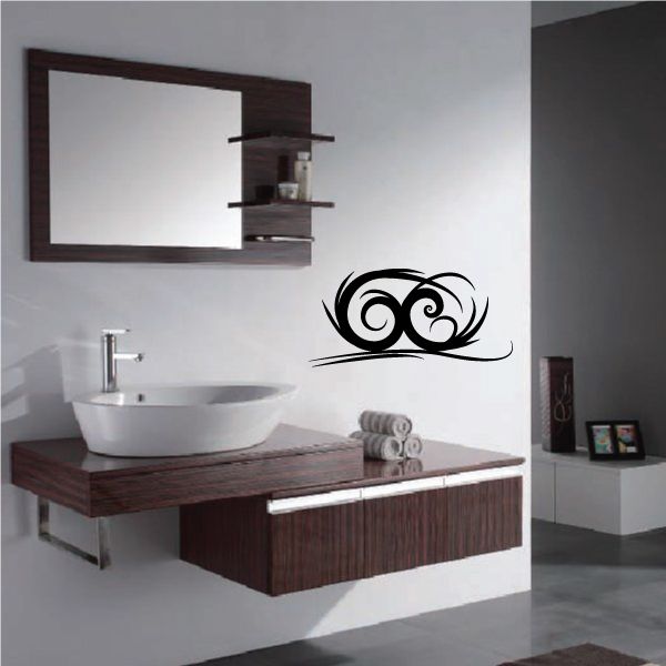 Black tribal owl wall decal with curled tail and swirling accents