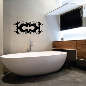 Tribal wall decal with black abstract winged pattern