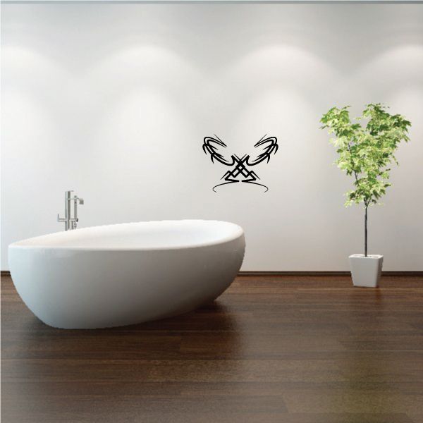 Black tribal pinstripe wall decal with stylized winged face emblem