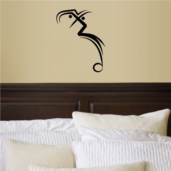 Tribal pinstripe wall decal, black stylized animal eye and curved tail