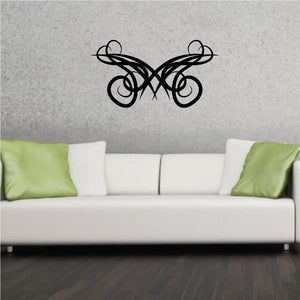 Tribal pinstripe vinyl wall decal, black scroll design on wall above sofa