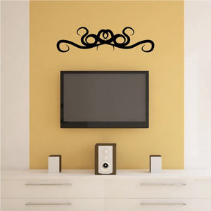 Black tribal scroll wall vinyl decal with ornate symmetrical curls