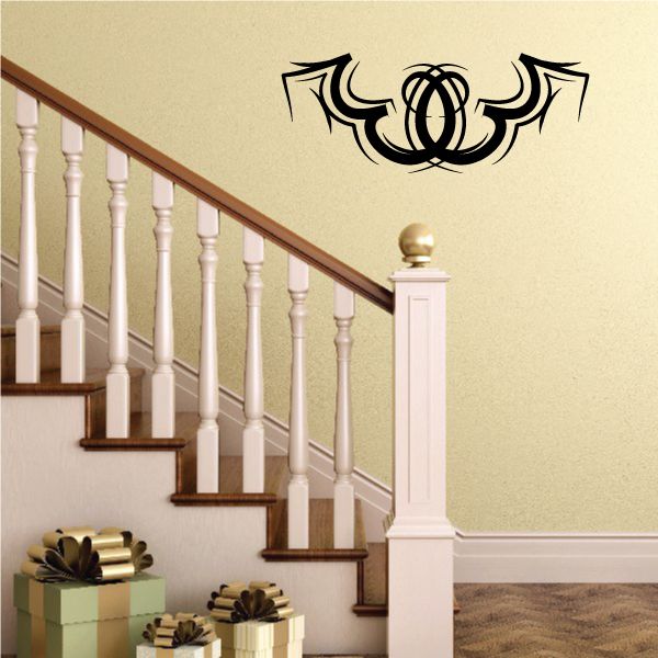 Tribal pinstripe wall decal with black ornamental emblem, vinyl sticker