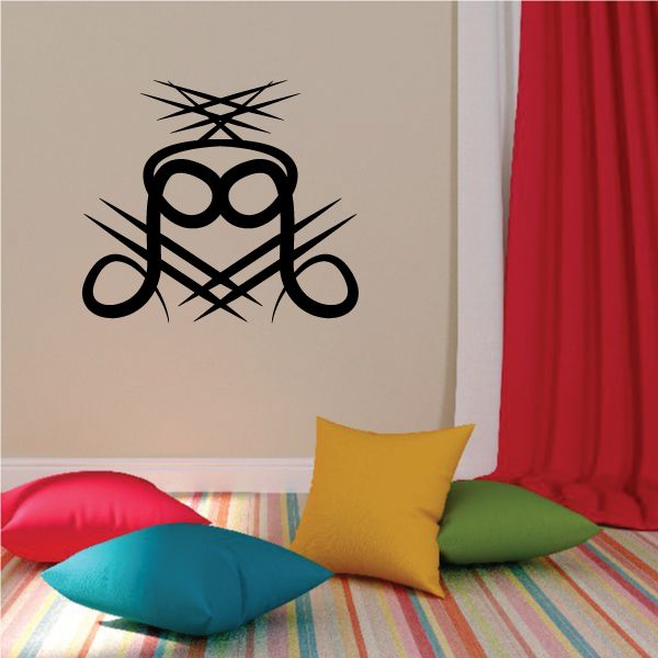 Black tribal pinstripe wall decal with stylized face and crossed line details